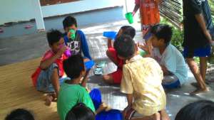 The children enjoying their glass of milks