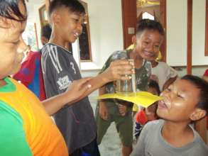 The children trying the experiment by themselves