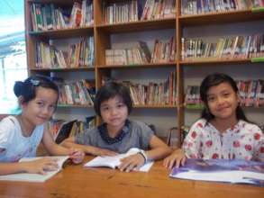 The children enjoying new books