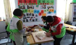 The staff make dumplings for the elderly
