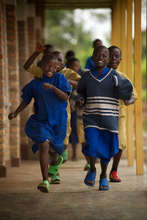 Students Running Near a New Classroom