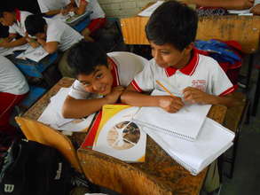 Students using the IMIFAP workbooks
