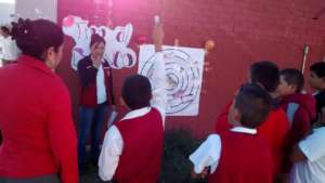 Students learning with a game