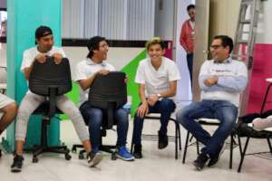 Ari, far left, in a workshop