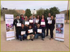 Happy teachers with their diplomas