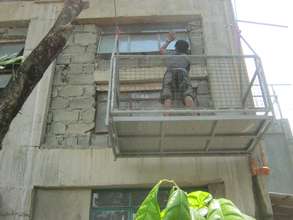 The gondola in use during window maintenance