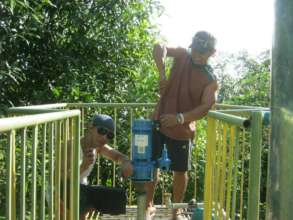 A new water pump being installed thanks to you
