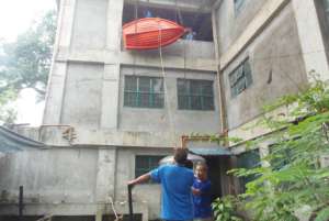 Another boat leaves from the center's top floor