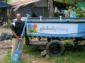 A rescue team member with his new boat!