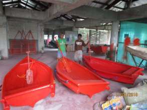 Three new boats waiting to leave the workshop