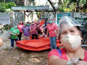 The Brgy. IVC boats leaving the boat shop