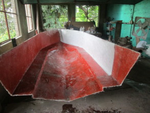 The first fibreglass layers laid in the mould