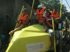 A crew wearing life-vests