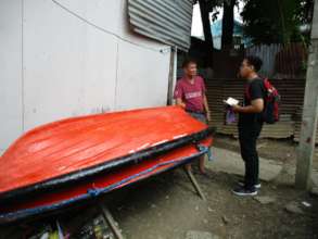 TJ chats to a boat crew leader during his visit