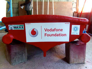 A small rescue boat featuring its sponsor's logo