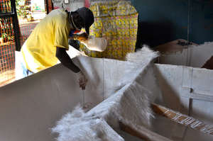 Boat builder Drissa working on a rescue boat