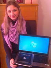 Our best student of 2013 with her new laptop