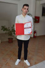 Adi, reciving award for best student leader