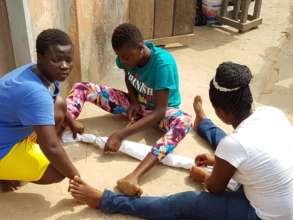 Her Colleagues Assisting Her