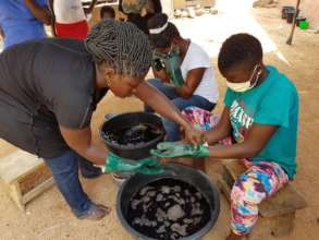 One Of The Young Mothers Been Assisted By Mentor