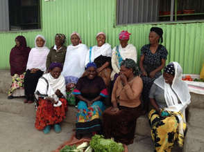 IGA beneficiaries at the re-constructed site.