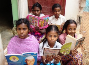Afzal using the mobile library book