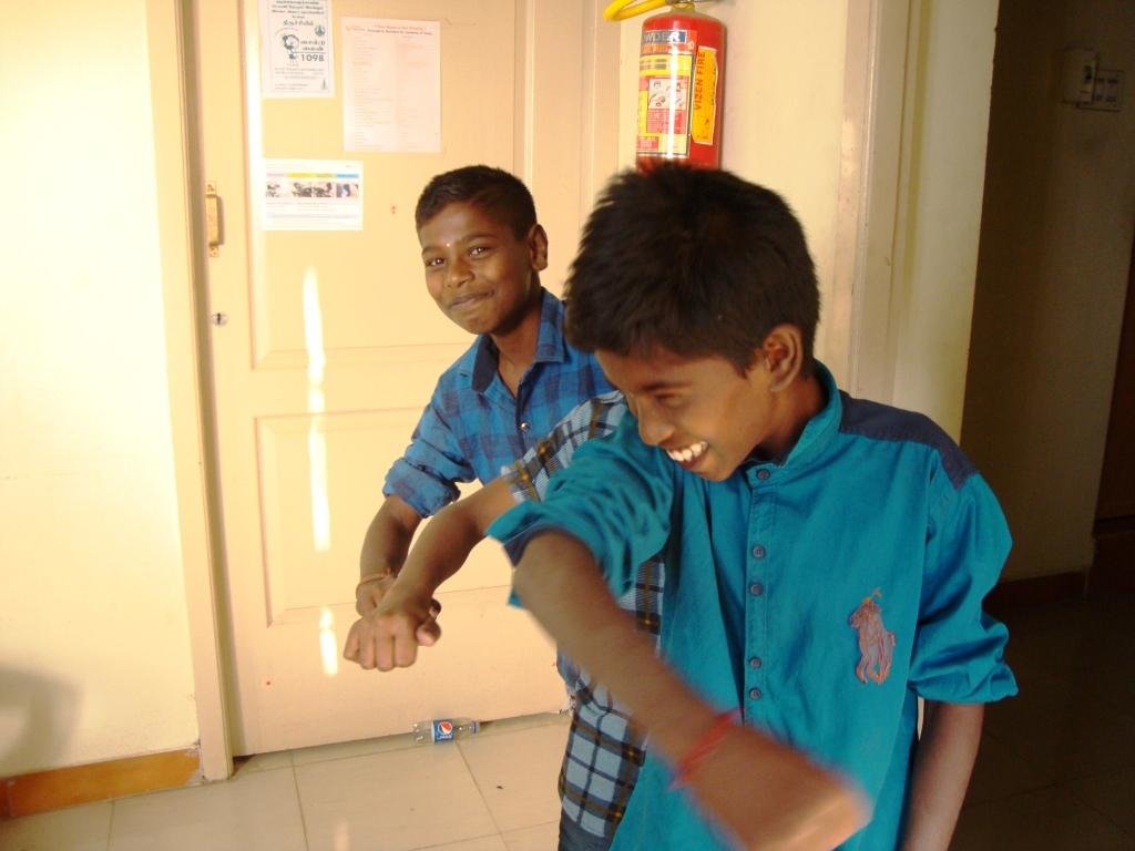 Boys dancing happily