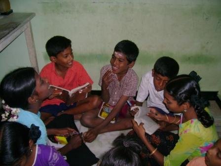 Coaching 100 school children in studies in India