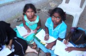 Coaching 100 school children in studies in India