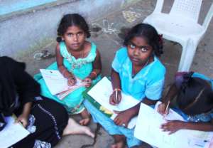 Coaching 100 school children in studies in India