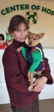 Recovering pup with rescuer
