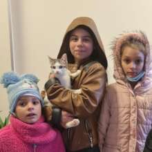 village girls bring in their pet cat