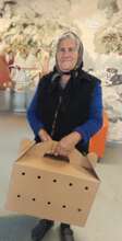 Elderly woman brings in her kitty for spaying