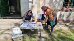 local registering her cats for spays