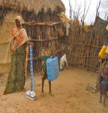 Fatima and daughter with new equipment.