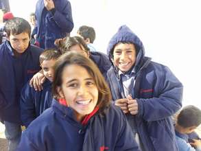 Syrian refugee children receive winter coats