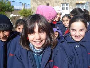 Syrian refugee children receive winter coats