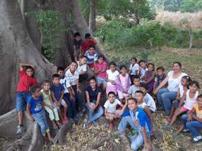 The children learning how to prepare for the rain