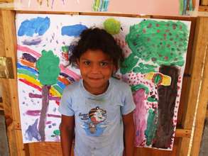 Proudly showing off her work!