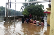 Massive Floods Displace Indonesian Families