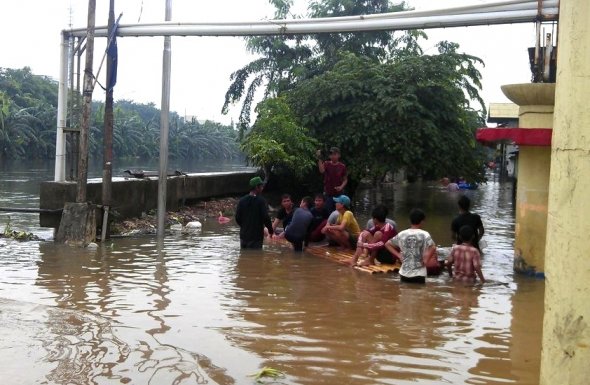 Massive Floods Displace Indonesian Families