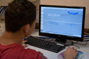 Student using design programme
