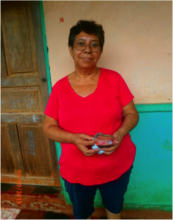 Here Adelina is holding her hard-earned payment