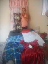 Nancy with her clothes she sells