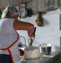Martha frosting the cake in her own way