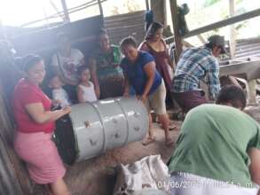 Juana along with her family building the new oven