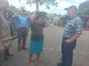 Juana selling her bakery products in the community