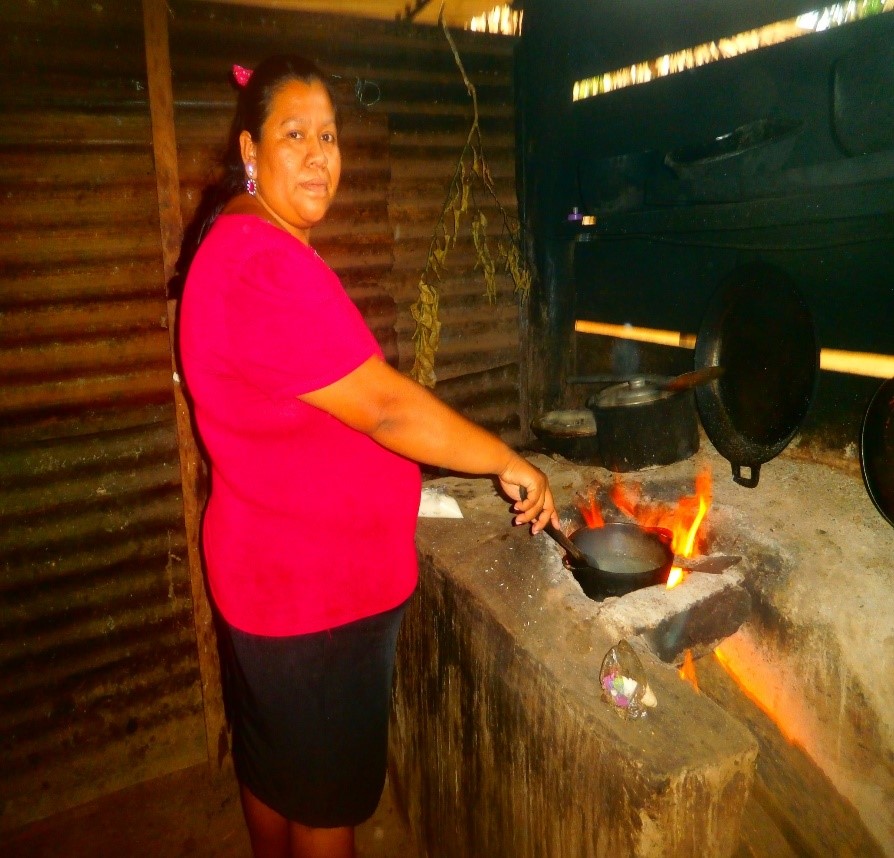 Emma working in her fritanga