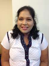 Anandhi facing the camera confidently