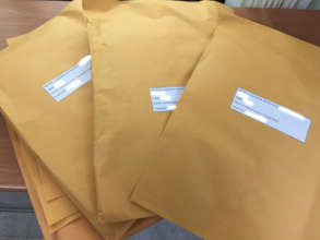 Packages with garments to assess